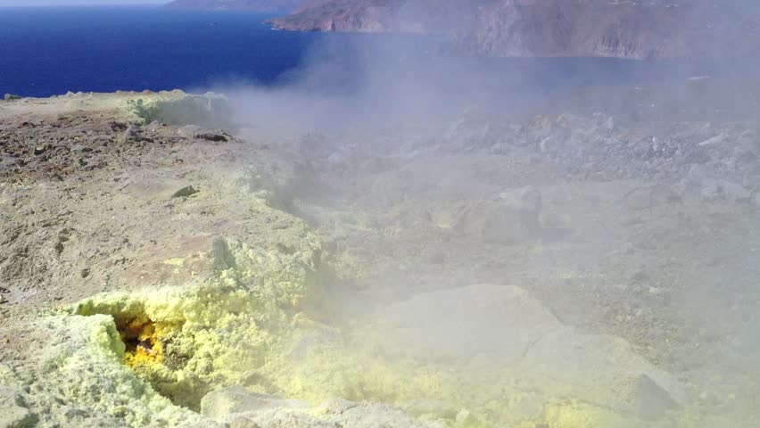 Solfatara steams on the rim of the volcanic crater on the Aeolian Island of Vulcano, Italy. 