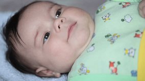 Close up of smiling baby's face. FullHD (1080p) video