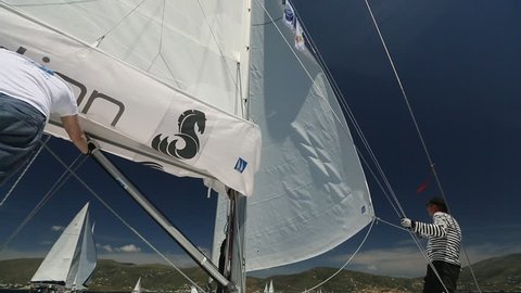 AEGEAN SEA, GREECE - APR 29, 2014: Unidentified sailors participate in sailing regatta "11th Ellada 2014" on Aegean Sea.