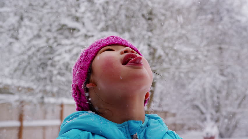 Girl Catching Snow Flakes On Stock Footage Video (100% Royalty-free ...