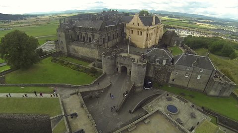 Flying over castle in Stirling, Scotland on a summer day