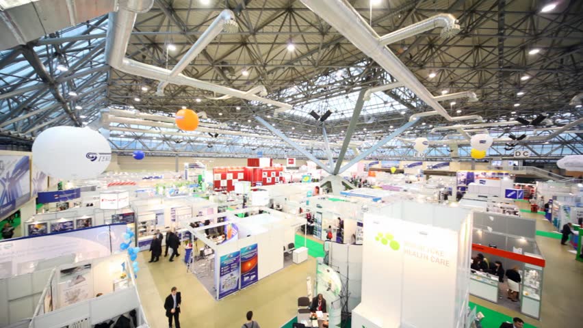 MOSCOW - DECEMBER 10: Review from left to right hall with people and exhibition pavilions on December 10, 2009 in Moscow. 