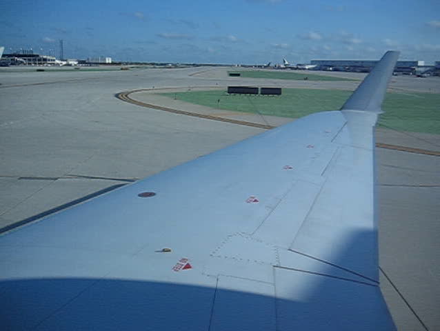 airplane taxing in runway of airport