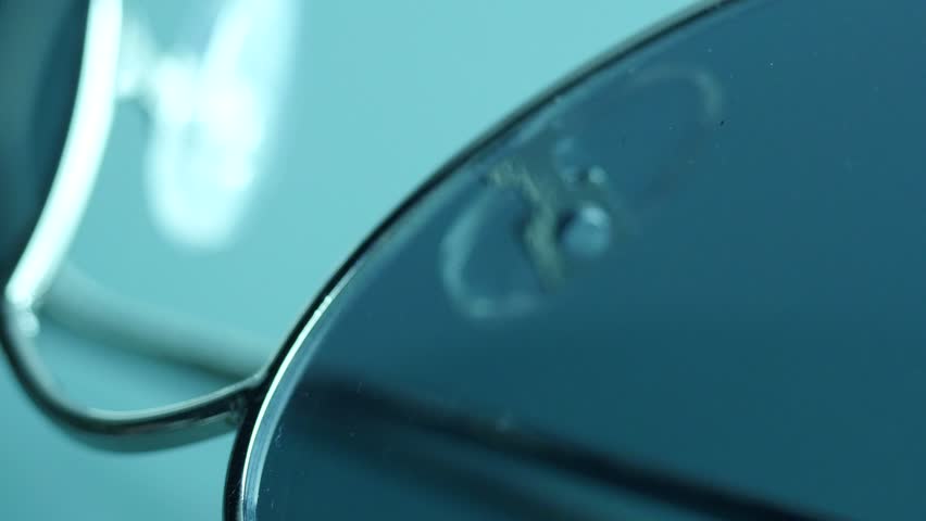 Stock Footage Police Badge and Gun Macro with Sound