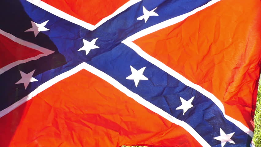 Shaking out a confederate flag in slow motion