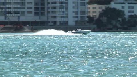 Boat navigating fast close to Miami coast
