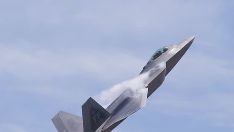 F22 Raptor fighter plane passing camera in slow motion