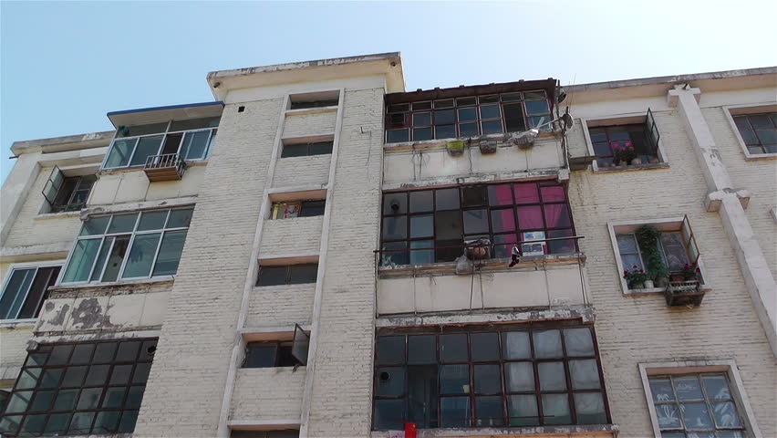 Jiayuguan City street in Gansu province northwestern China - building exterior tilt
