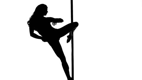 Silhouette of a sexy female pole dancing on white background
