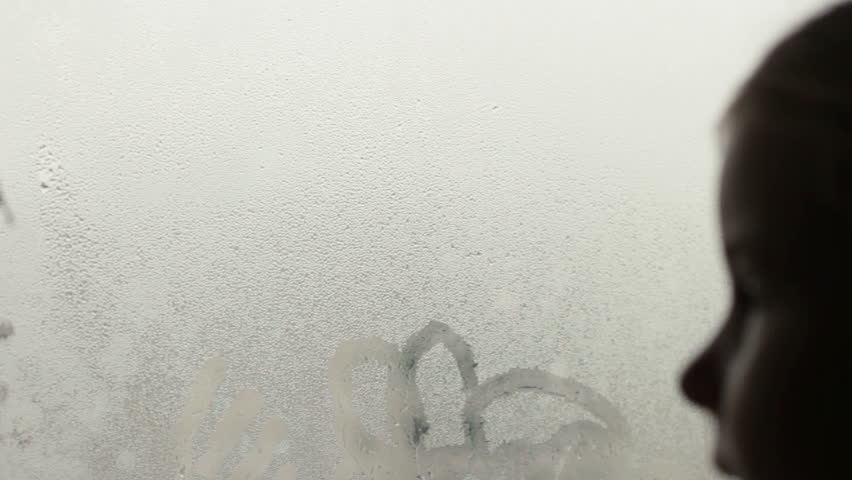 Child draws cloud on the window dew, hd Royalty-Free Stock Footage #7323727