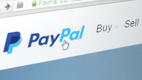 NEW YORK - SEPT 16: Using PayPal website on September 9, 2014. PayPal is an international e-commerce business allowing payments and money transfers to be made through the Internet.