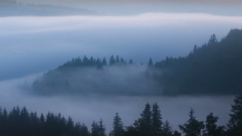 Time lapse clip. Fantastic mountain landscape with fog. Carpathian, Ukraine, Europe