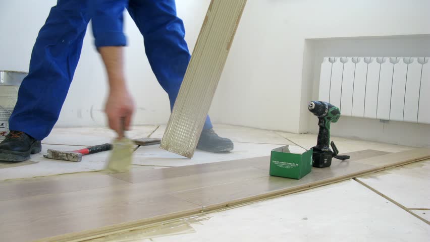 Workers were laid the parquet floor in room, time lapse | Shutterstock HD Video #7347166
