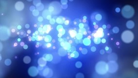 Abstract motion background in blue colors, shining light, stars, particles, energy waves, seamless looping.