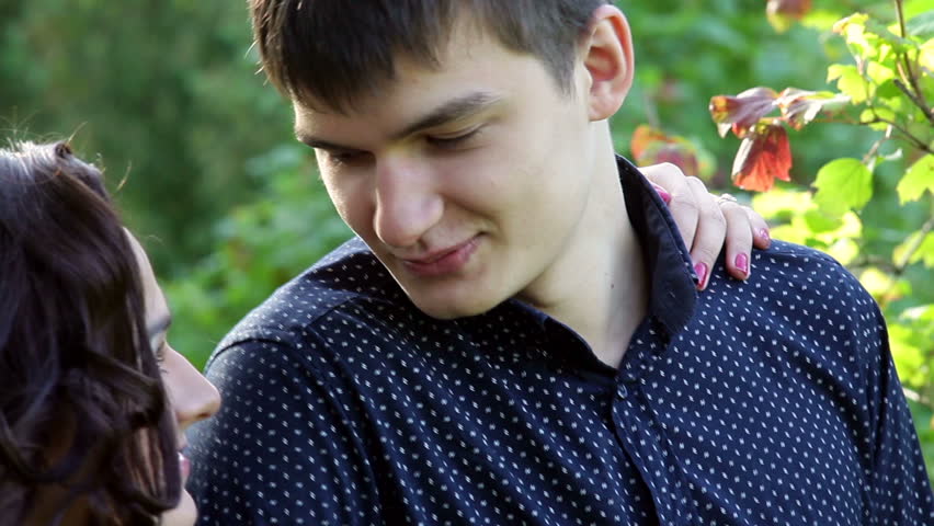 Happy young couple in love at the park
