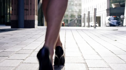 Sexy legs black high heels walking in city urban street - RED EPIC DRAGON 6K