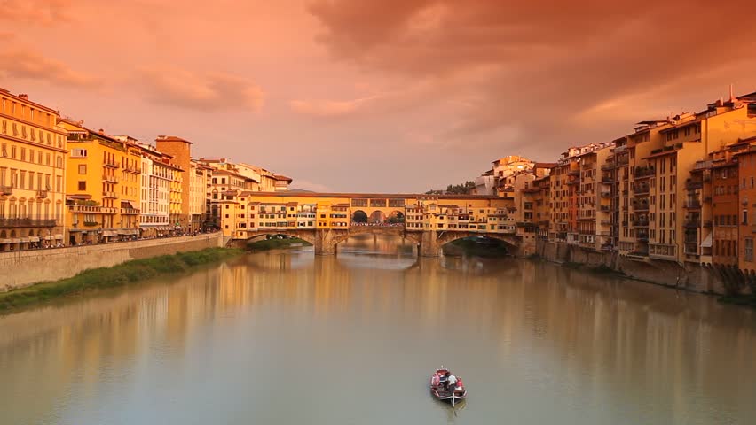 Time-lapse of Ponte Vecchio at sunset, Florence, Tuscany, Italy. Royalty-Free Stock Footage #7392733