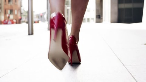 Sexy legs red high heels walking in city urban street - RED EPIC DRAGON 6K