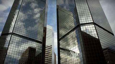 (1185) City Skyscrapers Urban Office Buildings Architecture Time-lapse Clouds LOOP. 