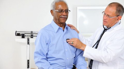 Doctor listening to a patient's heartbeat.