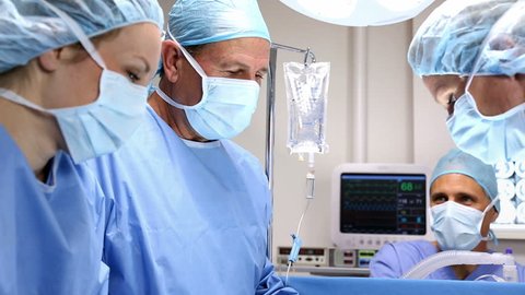 Surgical team in operating room.