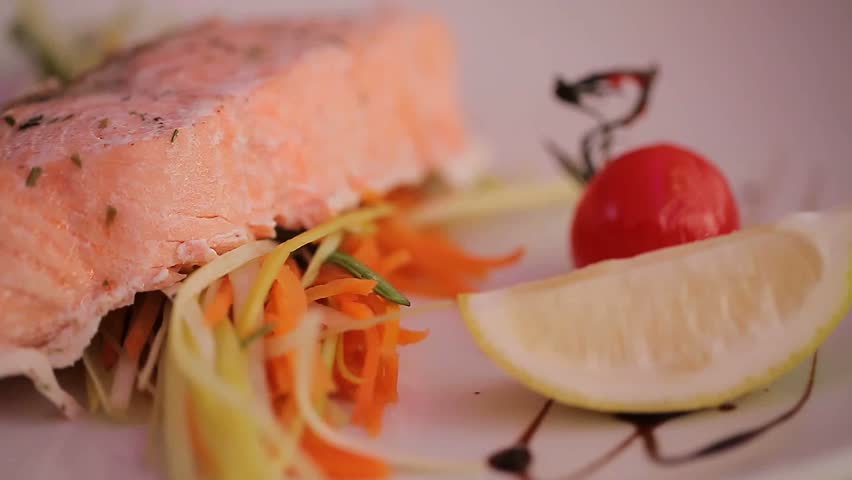 cooked with spices red fish on a platter