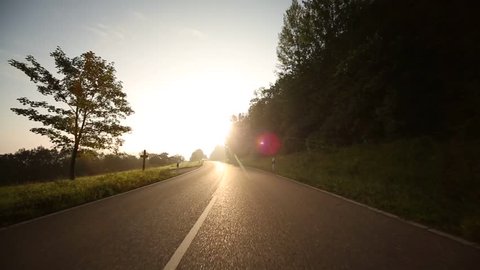 P.O.V. On-Board camera Video footage in HD - Driving on the Swabian Alb in Germany in the morning (With Canon 5D Mark III) pov with flare