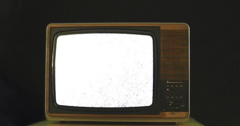 Dolly into Vintage 1970s TV with bad reception. 76 years of television history came to an end at midnight on Wednesday 24 October 2012 when the analogue TV signal was switched off. (UK, July 2014) 