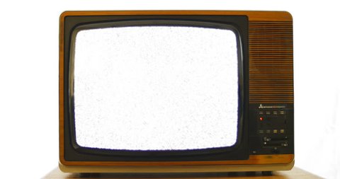 Slow zoom into vintage 1970s television. 76 years of television history came to an end at midnight on Wednesday 24 October 2012 when the analogue TV signal was switched off. (UK, July 2014) 