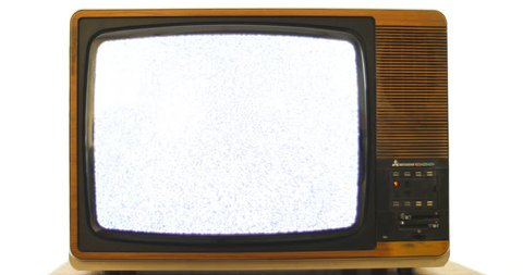 1970s Vintage television with interference. 76 years of television history came to an end at midnight on Wednesday 24 October 2012 when the analogue TV signal was switched off. (UK, July 2014) 