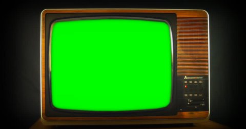 1970s Vintage television with green screen. 76 years of television history came to an end at midnight on Wednesday 24 October 2012 when the analogue TV signal was switched off. (UK, July 2014) 