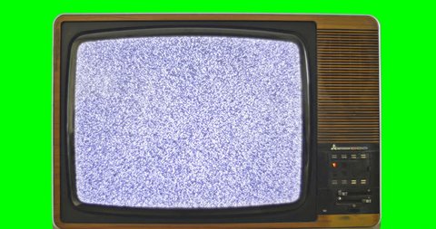1970s TV set with green screen background. 76 years of television history came to an end at midnight on Wednesday 24 October 2012 when the analogue TV signal was switched off. (UK, July 2014) 