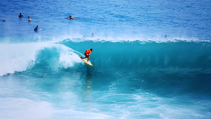 A surfer gets barreled in slow motion | Shutterstock HD Video #7442503