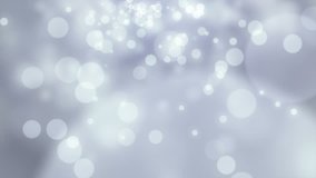 Abstract motion background, shining light, stars, particles, rays, seamless looping.