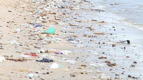 HD: Garbage on a sandy beach - environmental pollution, 1920x1080