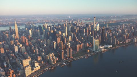 UN aerial, New York City sunrise and early morning light. Shot in 4K, dedicated plane, hard mounted open window allows a saturated, clear edge on the shot.