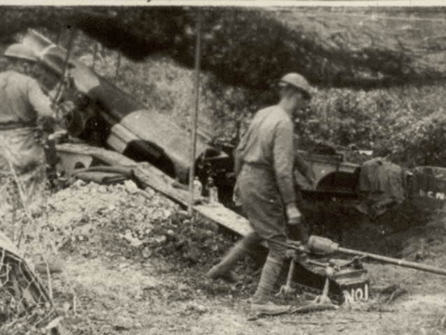 World War I - 1914-1918 Soldiers fire artillery canons. Montage of artillery.