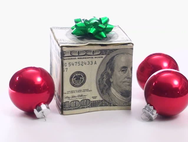 Box made of hundred dollar bills with holiday baubles loop - NTSC