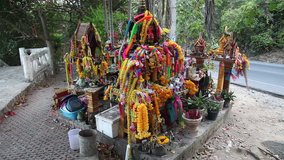 Thailand, Samui. Offerings at the houses of the Spirits near a road. HD Video 1920x1080 footage.