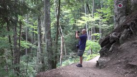 Tourist Walking Mountain Path Use Camcorder Shooting Wild Nature Mountain Images