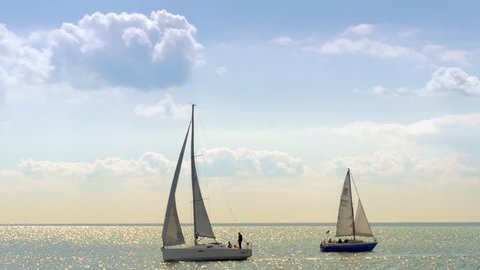 ENKHUIZEN, THE NETHERLANDS - AUGUST 30: Yachting in Markermeer lake on August 30, 2014. The racing of sailing boats is believed to have started in the Netherlands some time in the 17th century. 