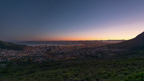 4K Timelapse 4096x2304 UHD of Cape Town city from Table Mountain as the sun rises, from night to day at sunrise. Holy grail time lapse shot in Cape Town South Africa 