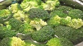 Cooking a portion of Broccoli (close-up footage)