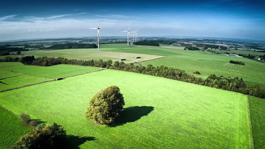 Aerial view of summer countryside with agricultural fields and wind turbines. Full HD, 1080p, 60FPS Royalty-Free Stock Footage #7522270