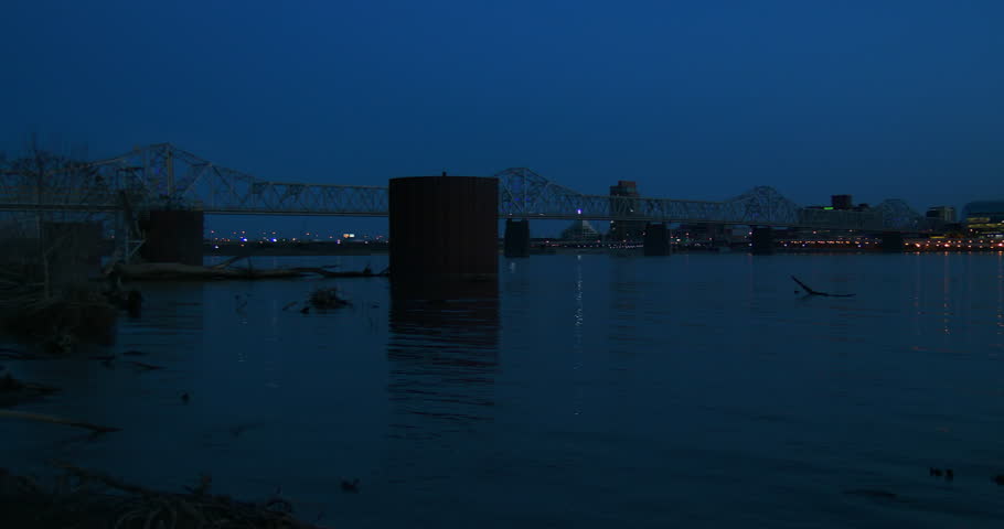 Pan across the skyline of Louisville, Kentucky at night.