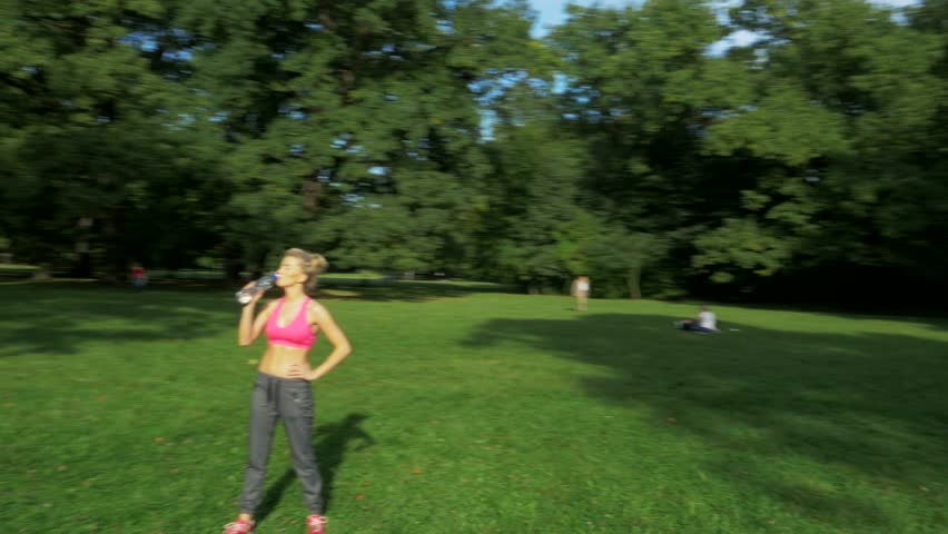 Young attractive woman exercising - aerial view