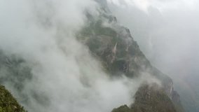 Time lapse video of Machu Picchu appearing out of the fog. Available in 4k