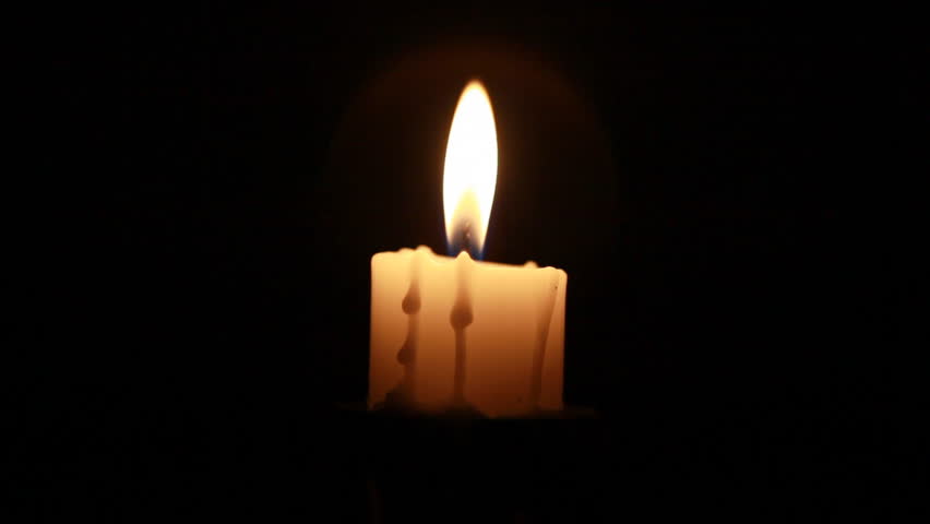 Candle in the night, close up