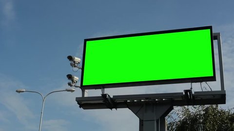 information billboard in the city near road - green screen - security cameras (radar) - closeup Arkistovideo