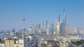 Shanghai skyline on a sunny clear day in time-lapse